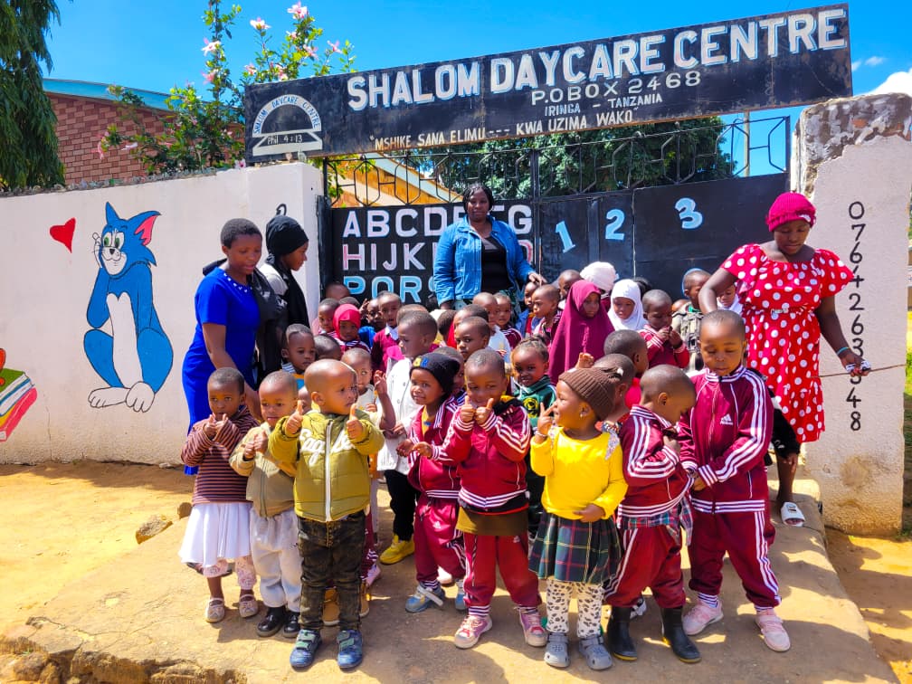 Children enjoying outdoor playtime at SHALOM Day Care in Iringa